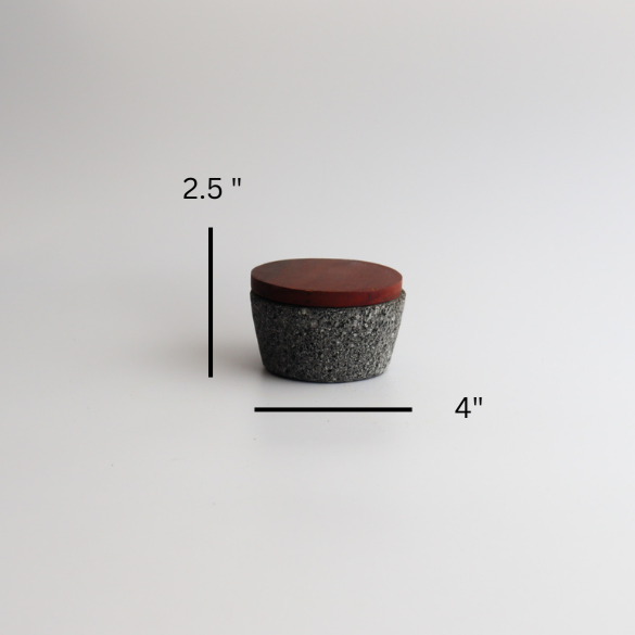 Studio CM | a small hand carved volcanic stone mortar measuring 2.5 x 4 "