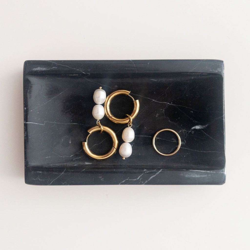 Studio CM | A black marble soap dish displayed as a jewelry tray