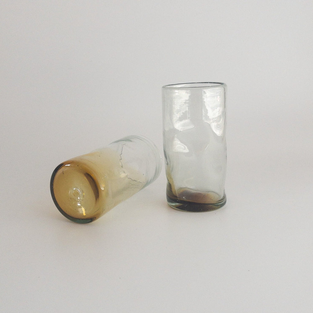 Studio CM | Handblown glass set of tumblers that have a textured finish and brown ombre and clear coloring