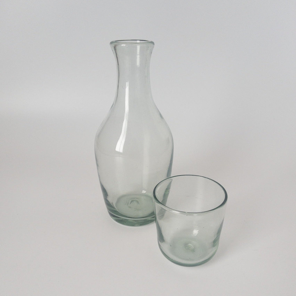 Studio CM | a handblown clear carafe with it's cup as a top made in Jalisco from recycled glass