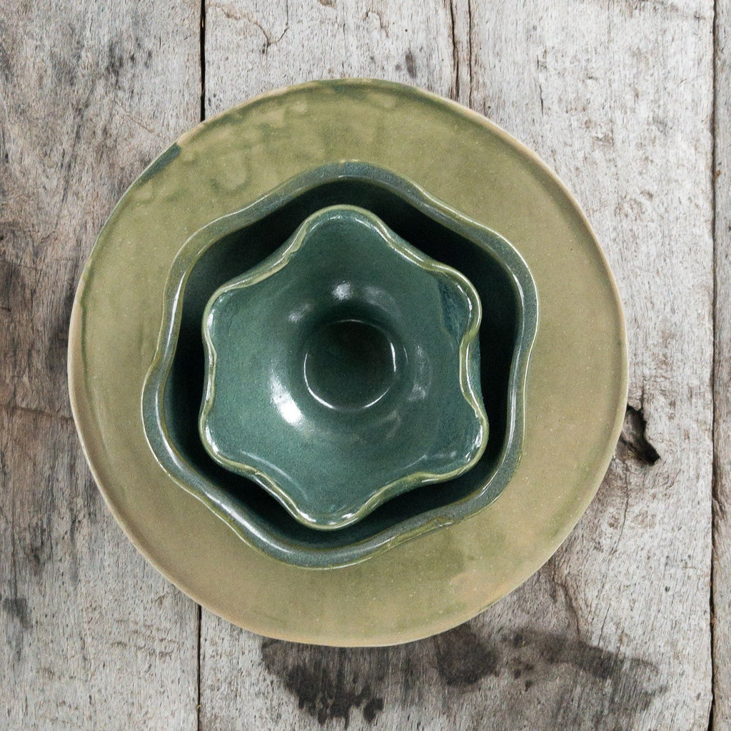 Studio CM | A green plate with two ceramic wavy bowls that fit inside each other handmade in Oaxaca