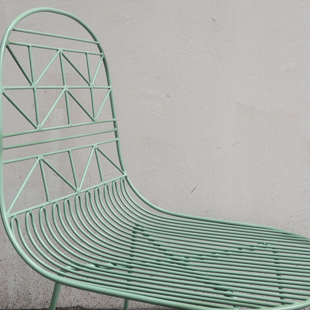 Studio CM | modern teal rod iron chair with a light and delicate pattern