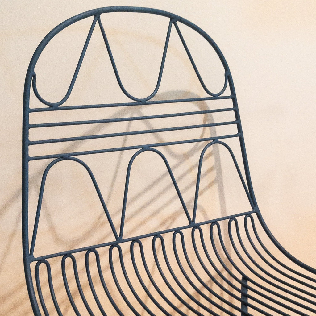 Studio CM | modern blue  rod iron chair with a light and delicate pattern