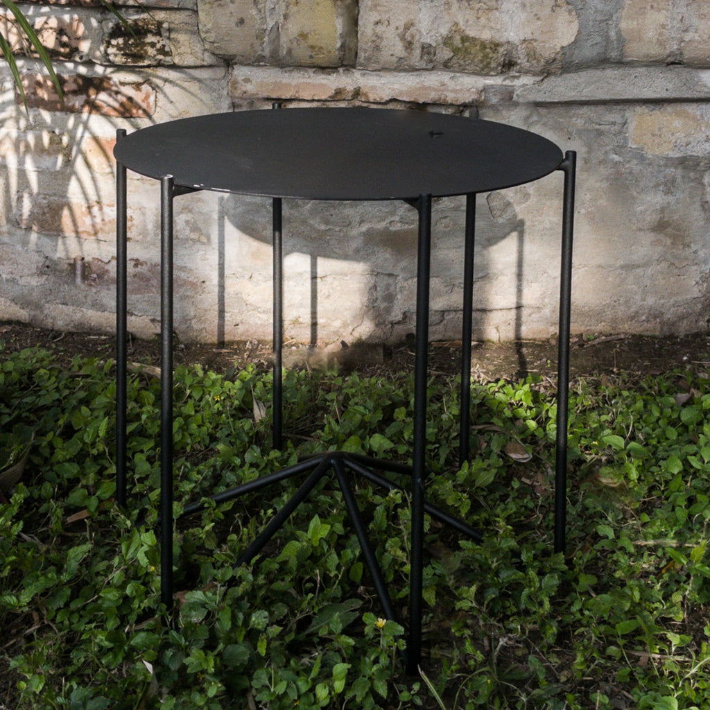 Studio CM | a modern rod iron side table that is one piece welded in Guadalajara Mexico