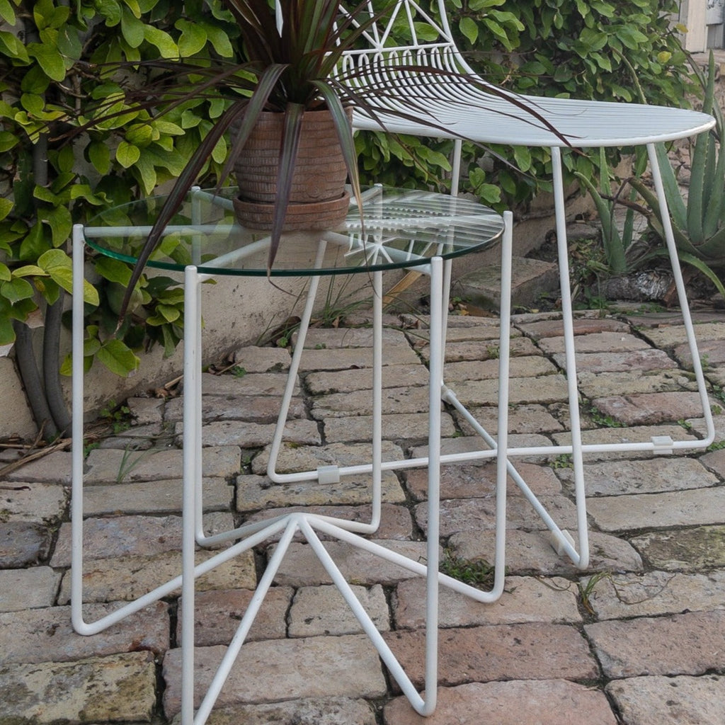 Studio CM | a white side table made of rod iron with a round tapered glass top made in Guadalajara Mexico