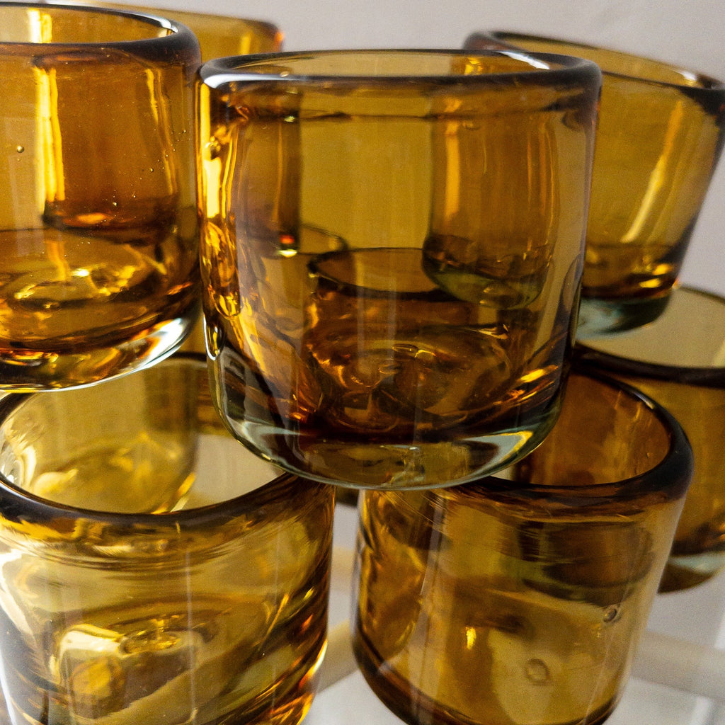 Studio CM | an amber shot glass made from recycled glass in Jalisco Mexico