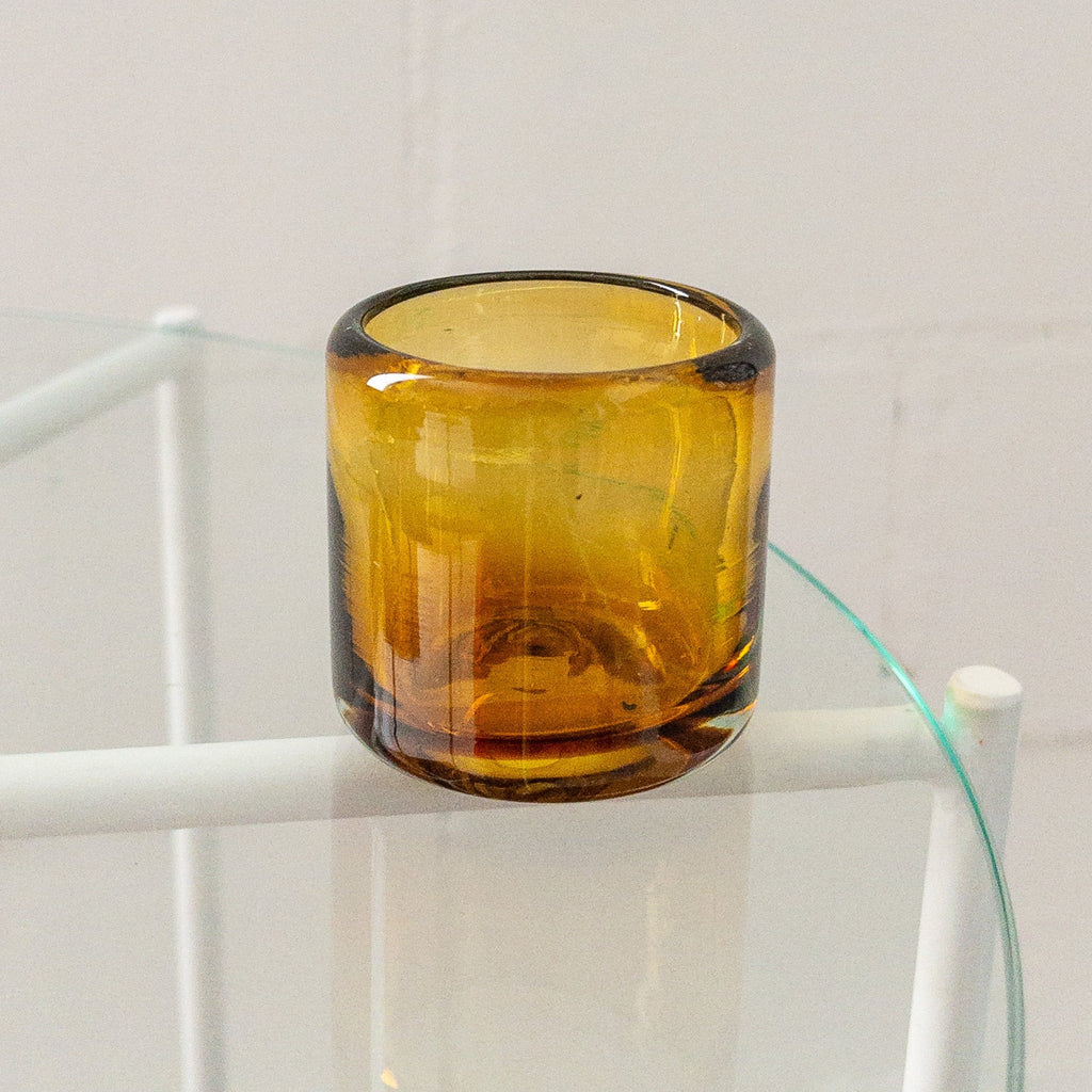 Studio CM | an amber shot glass made from recycled glass in Jalisco Mexico