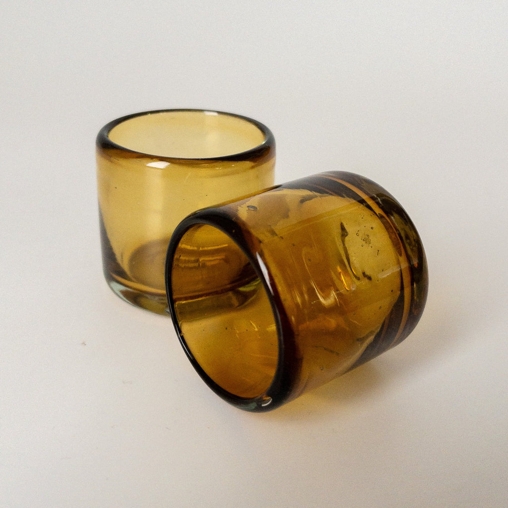 Studio CM | an amber shot glass made from recycled glass in Jalisco Mexico