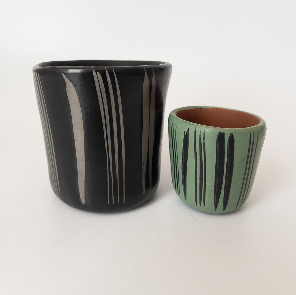 Studio CM | black  and teal ceramic cups that has hand painted designs in gray ink made in Michoacan, Mexico