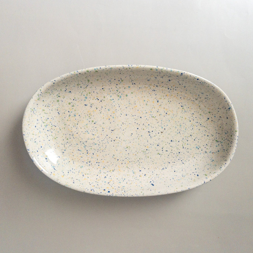 Studio CM | A gray ceramic tray adorned with multicolored speckles hand painted and made in Michoacan, Mexico