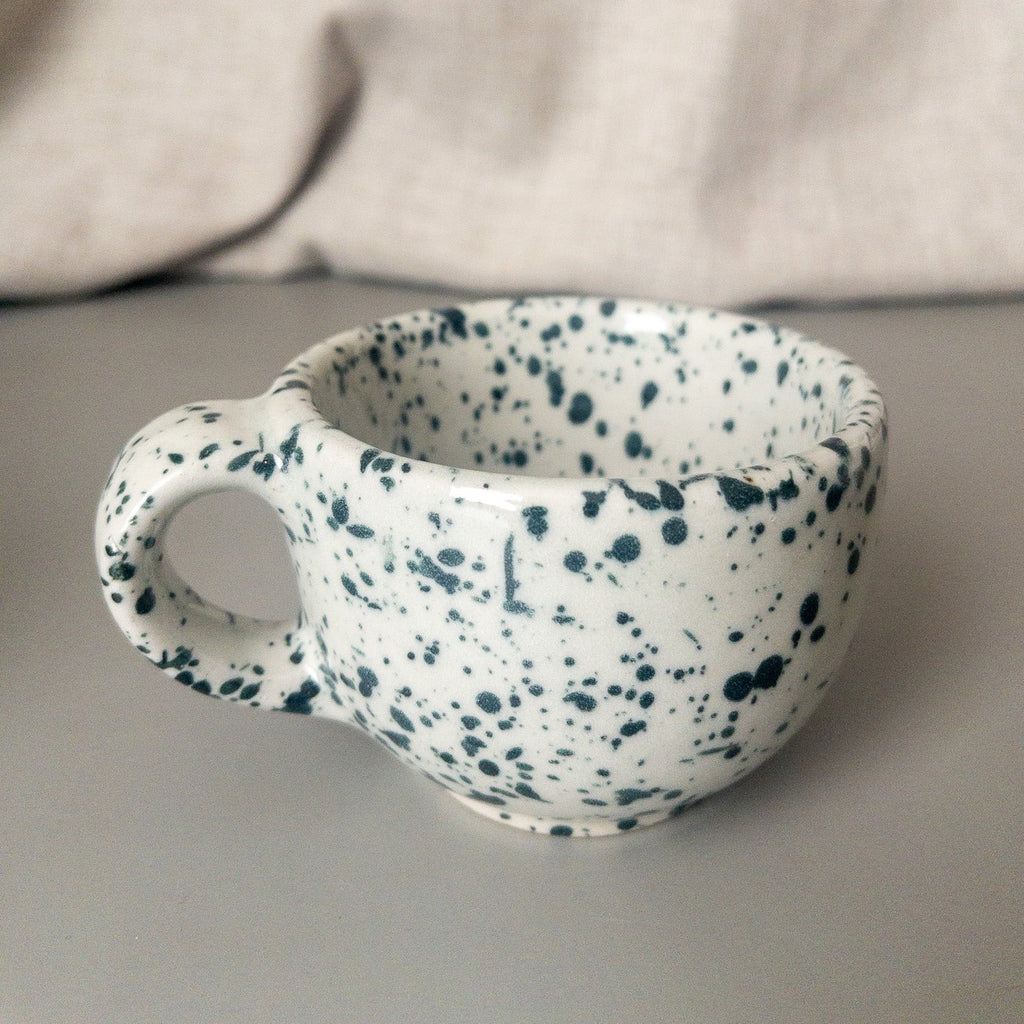 Studio CM | a ceramic mug that is gray and speckled blue hand made in Michoacan 