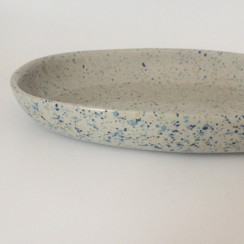 Studio CM | A gray ceramic tray adorned with multicolored speckles hand painted and made in Michoacan, Mexico