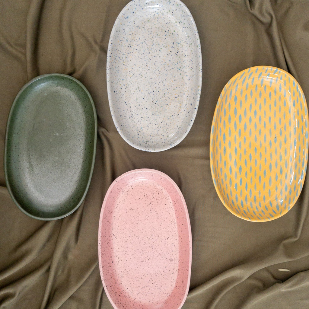 Studio CM | four different colored ceramic trays hand painted and made in Michoacan, Mexico