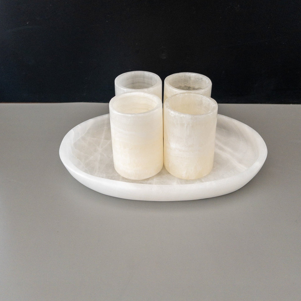 Studio CM | A set of hand carved onyx shot glasses with their matching tray. Made in Jalisco Mexico. 