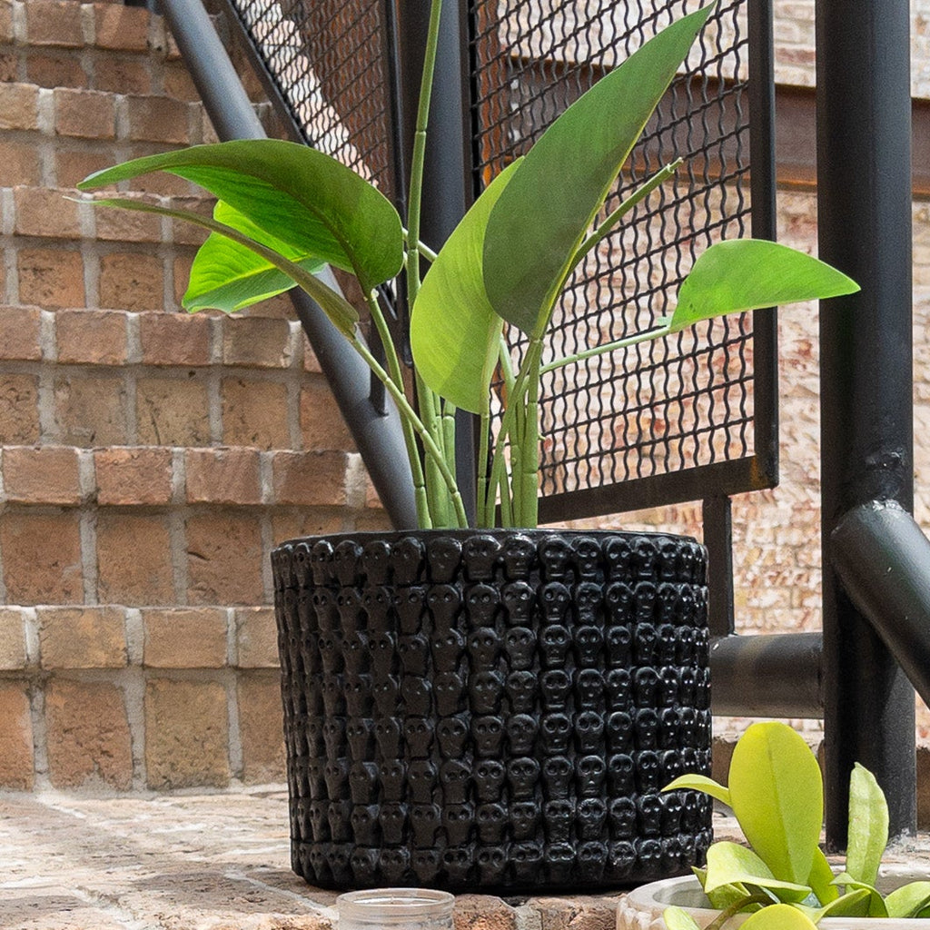 Studio CM | A black ceramic planter handmade in Jalisco with skeleton prints
