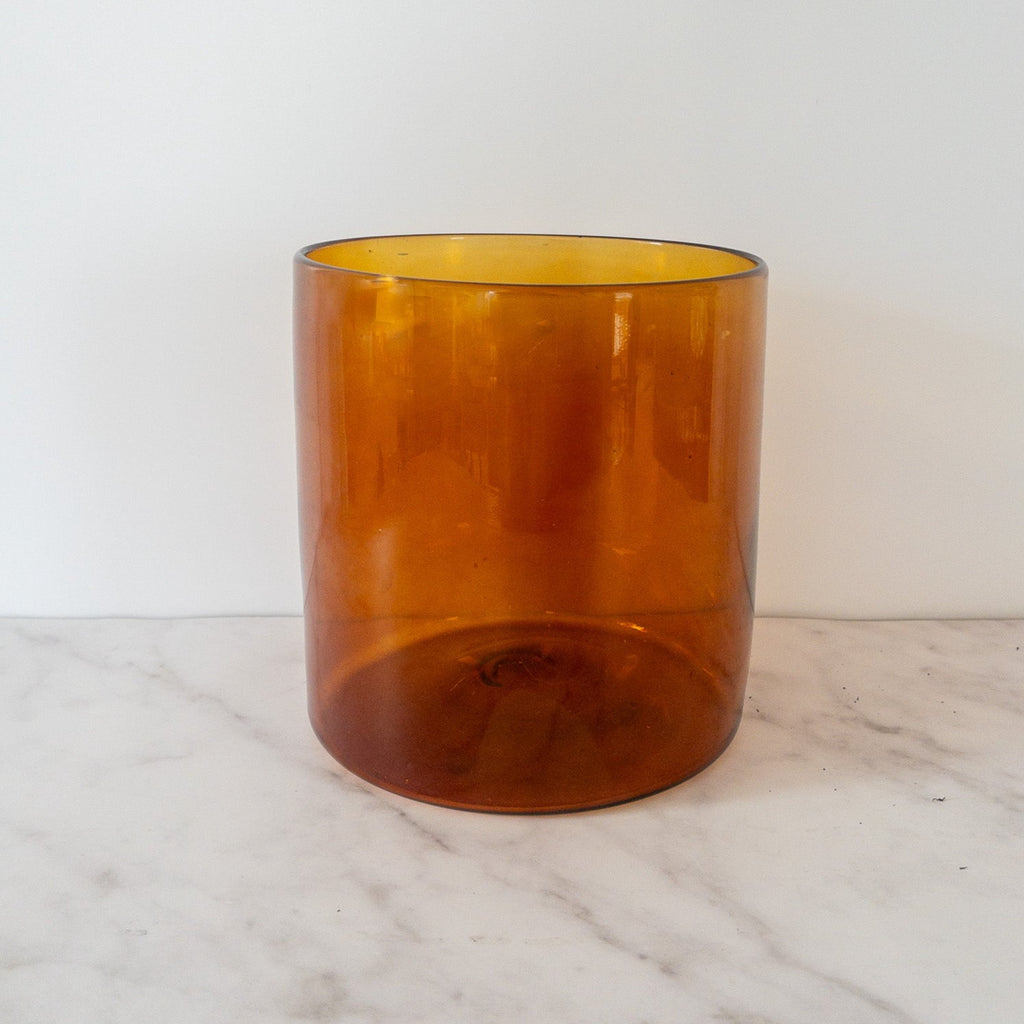 Studio CM | A handblown amber cylindrical vase made from recycled glass in Jalisco, Mexico