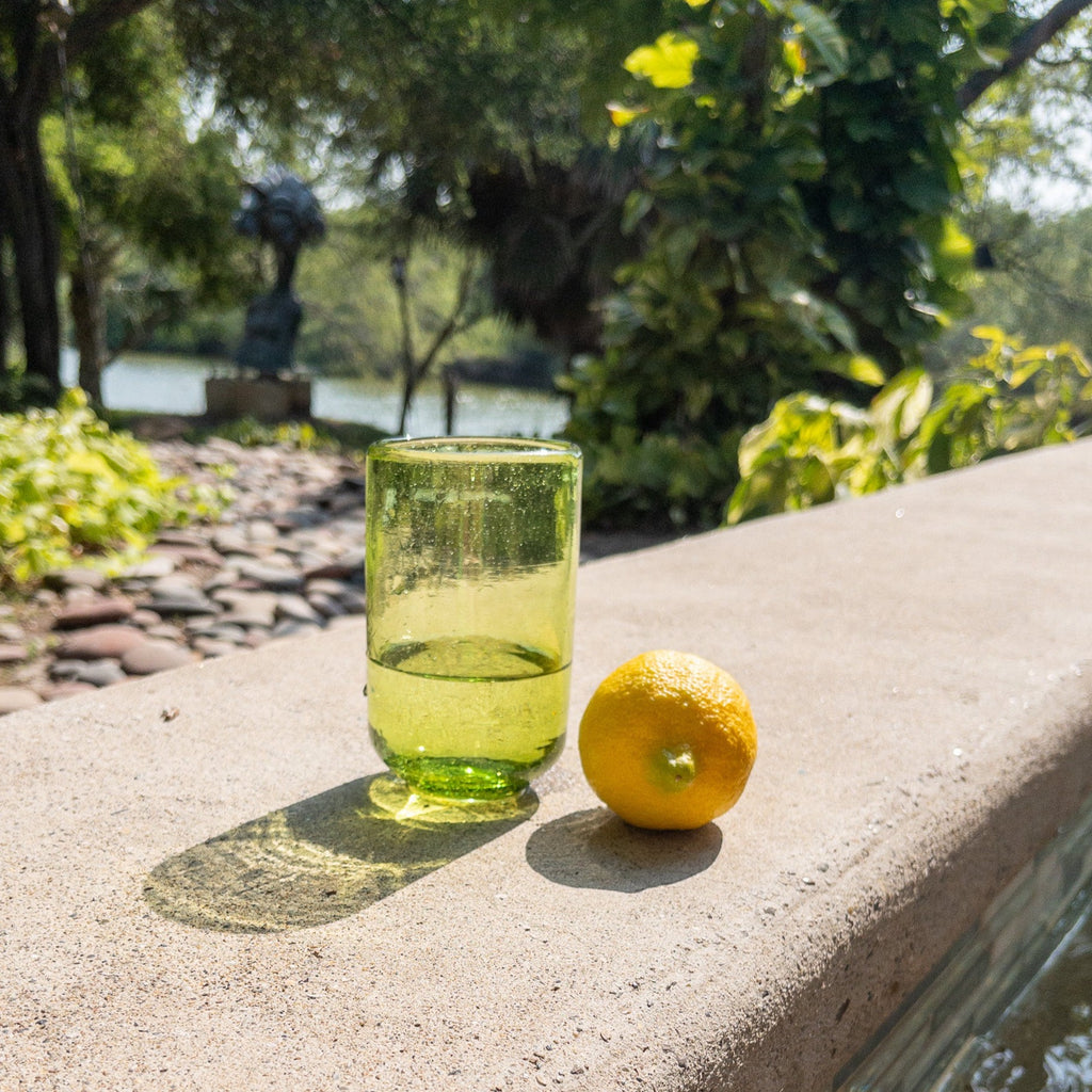 Studio CM | A green handblown glass with a round bottom giving it a modern design. Made in Jalisco Mexico. Set of 6.