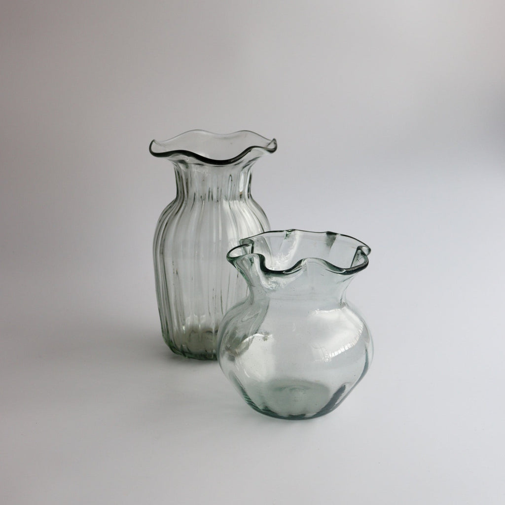 Studio CM | two  handblown clear vases with a wavy abstract mouth shape