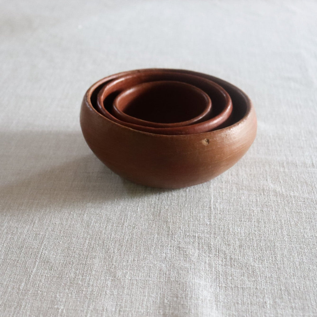 Studio CM | three ceramic nesting bowls stacked inside each handmade in Oaxaca Mexico from traditional red clay