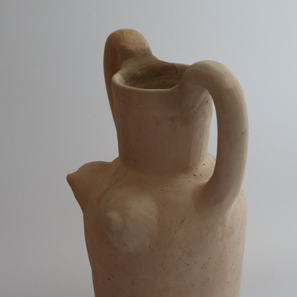 Studio CM | a vase in the form of a female body made by hand in Oaxaca with raw clay and finished with a natural glaze