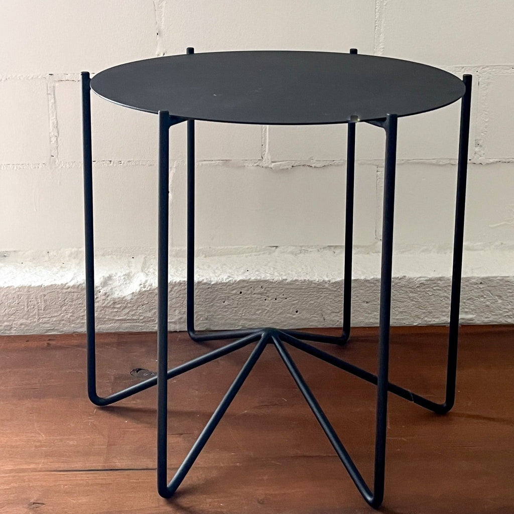 Studio CM | a modern rod iron side table that is one piece welded in Guadalajara Mexico