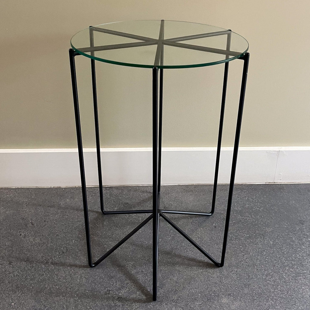 Studio CM | a black side table made of rod iron with a round tapered glass top made in Guadalajara Mexico