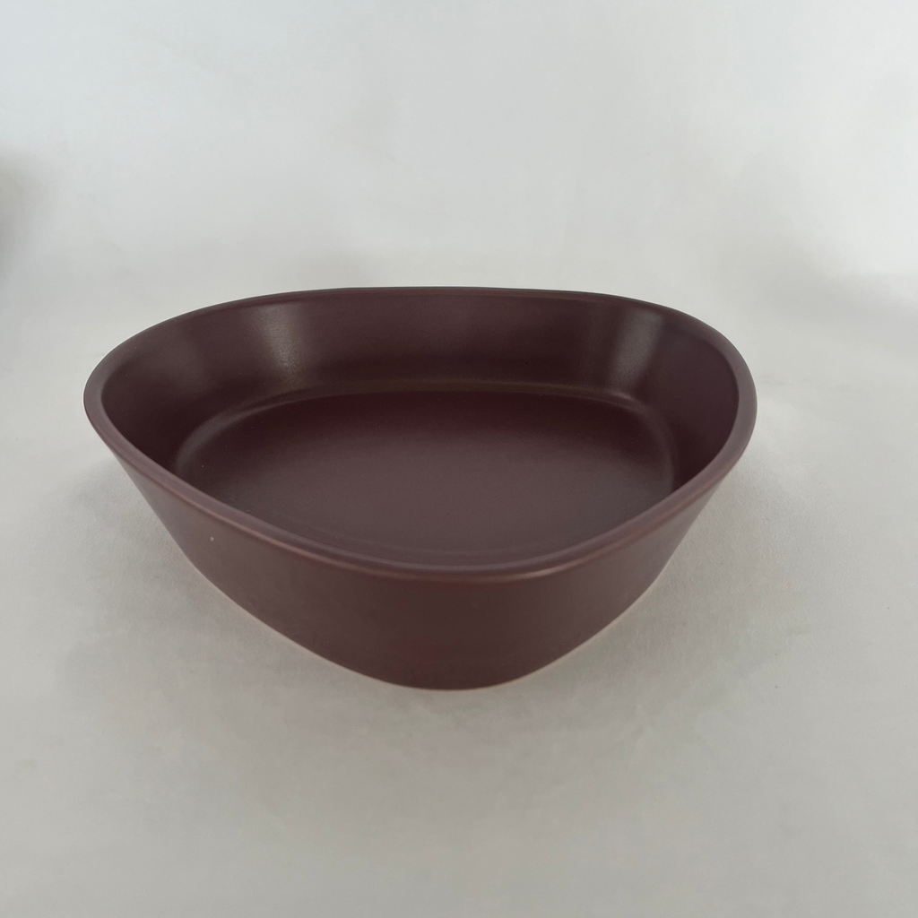 Studio CM | A deep triangular ceramic plate in a rich deep purple color