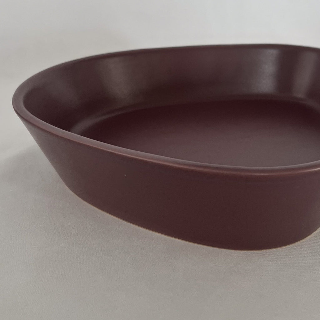 Studio CM | A deep triangular ceramic plate in a rich deep purple color