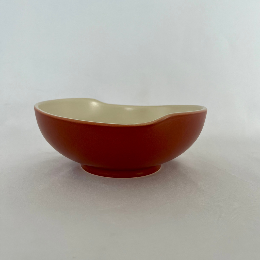 Studio CM | A two tone ceramic bowl with a rich terracotta color on the outside and white interior made in CDMX