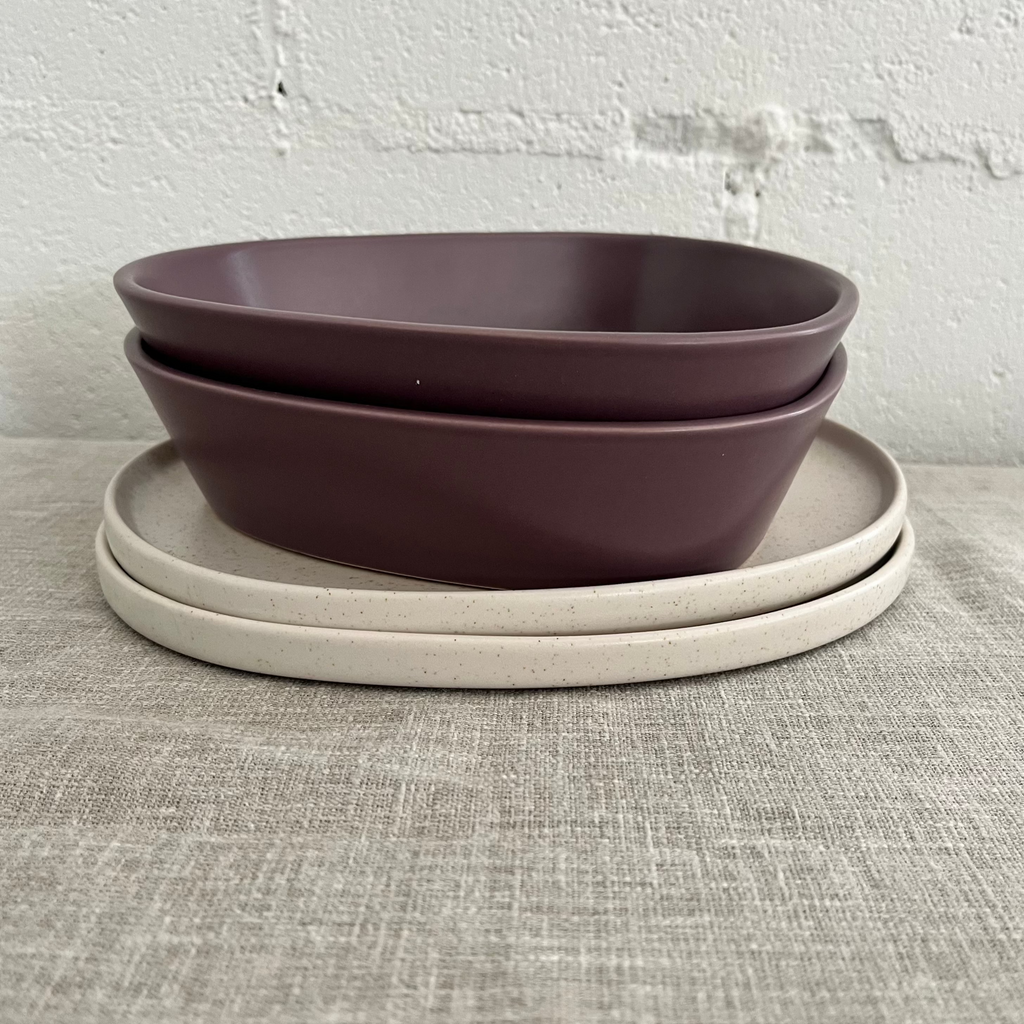 Studio CM | A deep triangular ceramic plate in a rich deep purple color