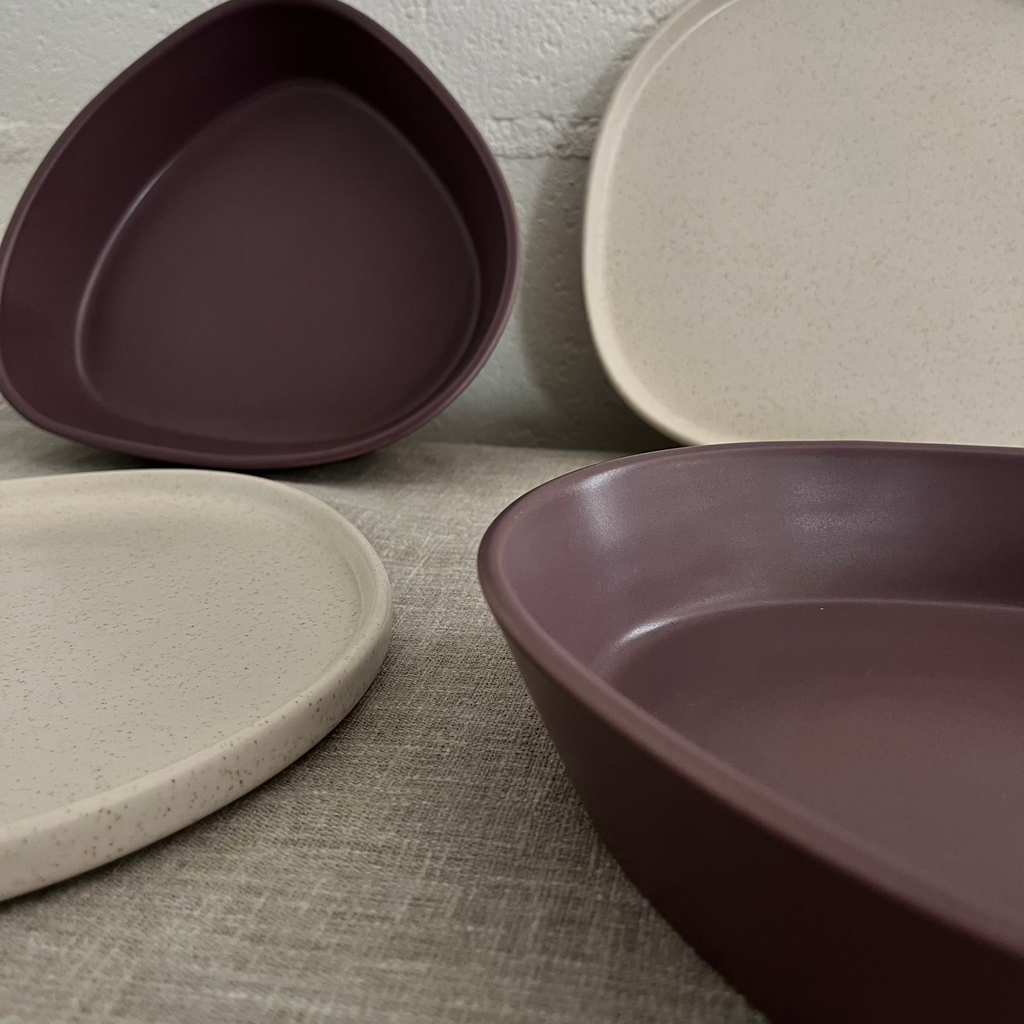 Studio CM | A deep triangular ceramic plate in a rich deep purple color