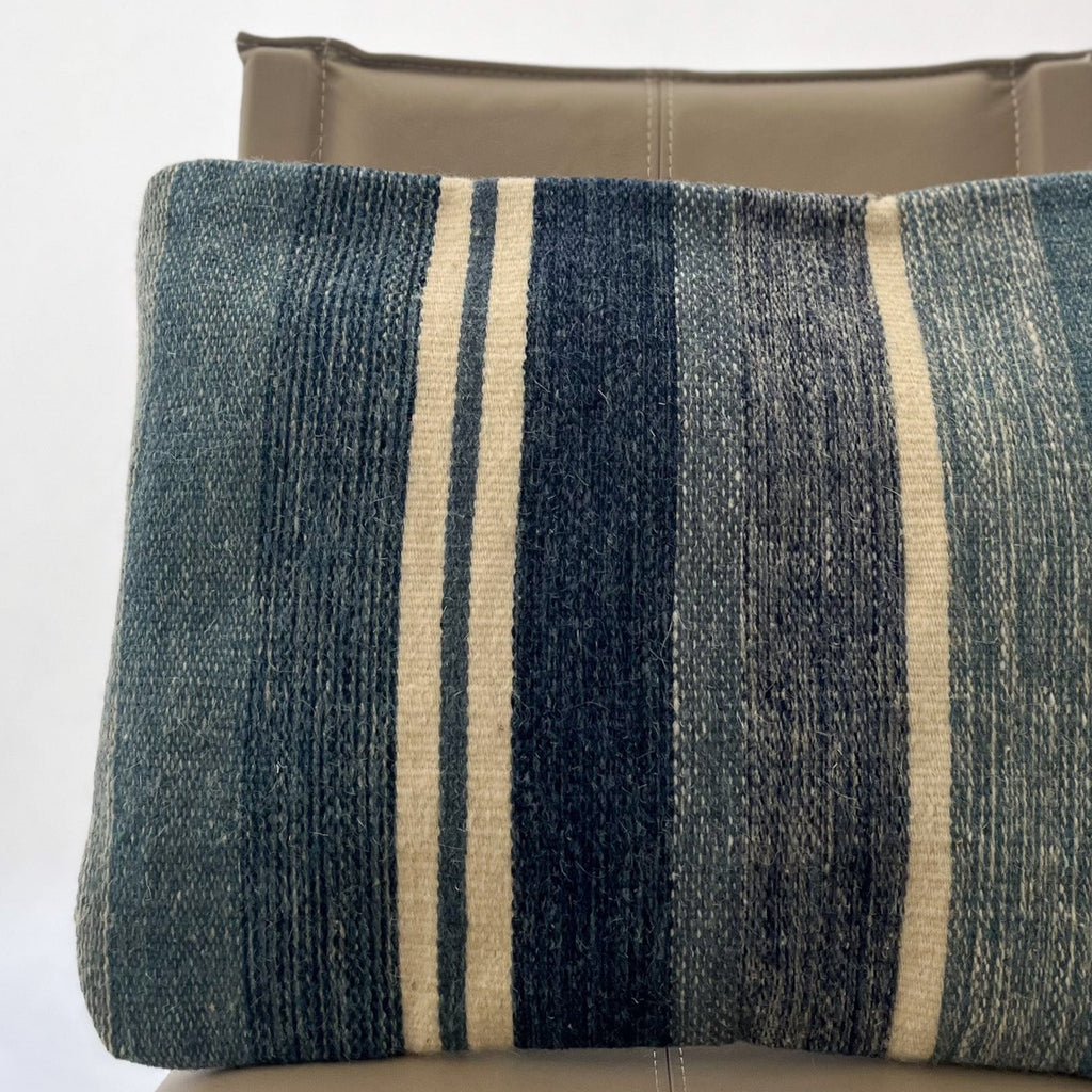 Studio CM | A stripped pillow case made of woven wool with blue and white colors. Handmade in Oaxaca.