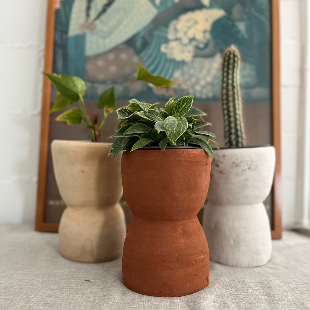 Studio CM | A collection of three planters in an hourglass shape that are handmade of ceramic in Oaxaca