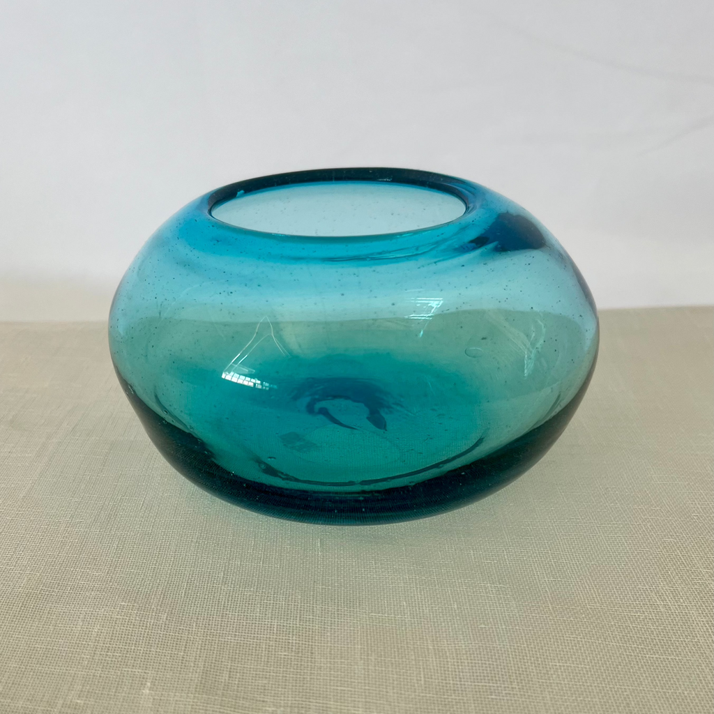 Studio CM | a small glass bowl that is a lovely blue color handblown from recycled material in jalisco mexico 