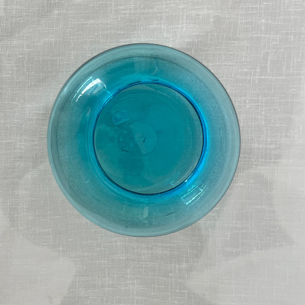 Studio CM | a small glass bowl that is a lovely blue color handblown from recycled material in jalisco mexico 