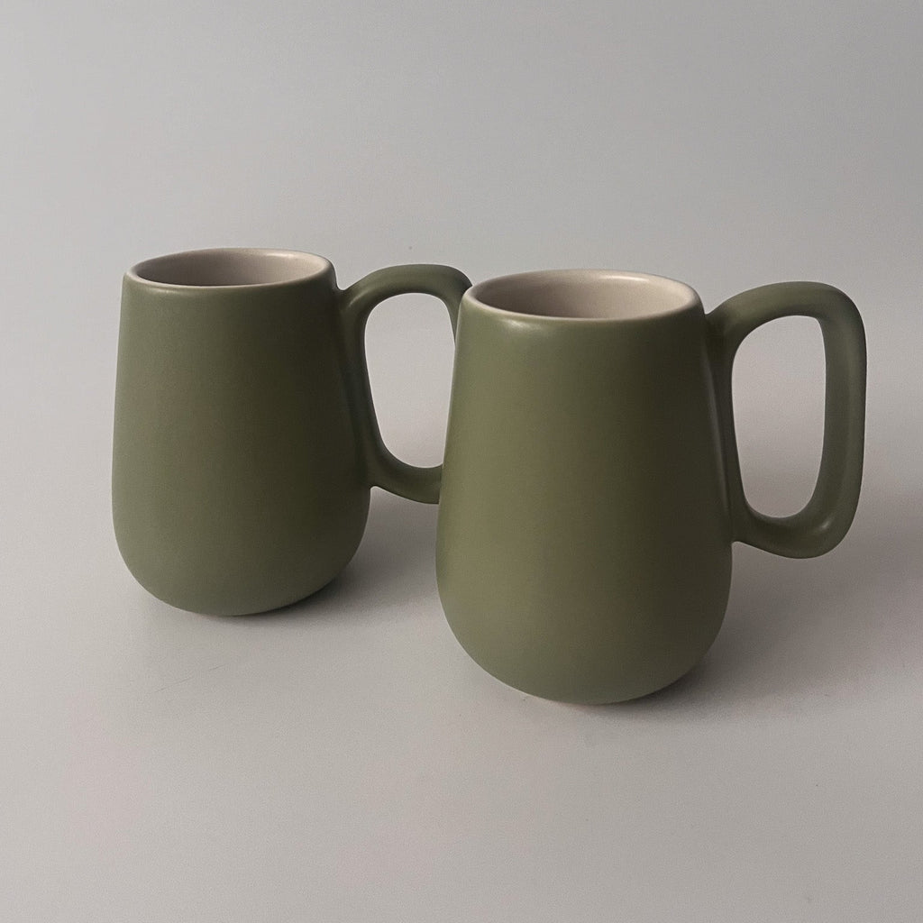 Studio CM | handmade ceramic mugs in a lovely green color on the outside and white ceramic inside