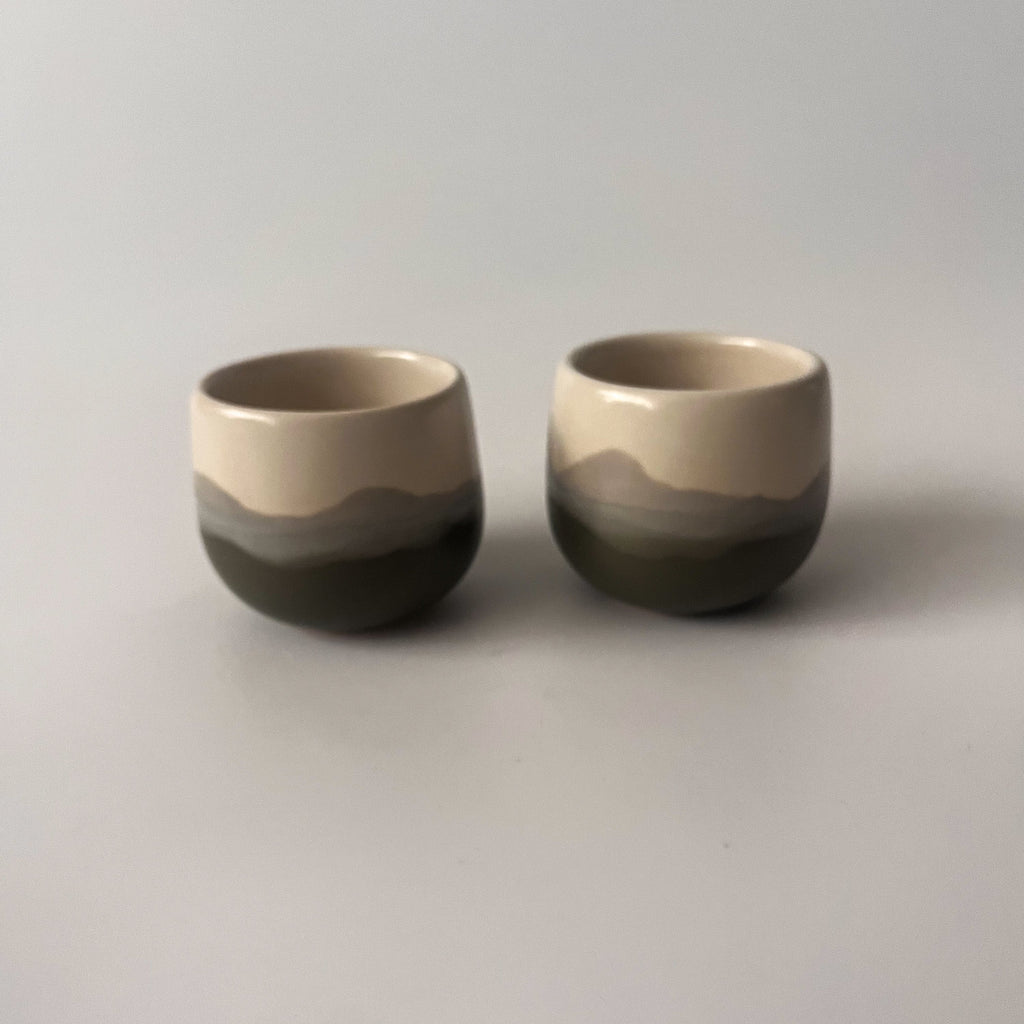 Studio CM | ceramic tea cups with a beautiful multicolored glaze that is part of a larger set