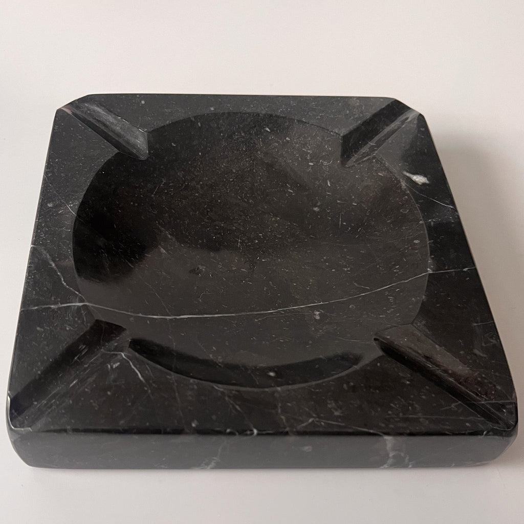 Studio CM | A black marble ashtray that is hand carved in Jalisco Mexico