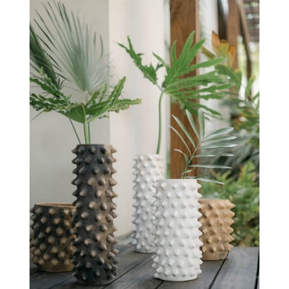 Studio CM | handmade ceramic planters in  black brown and white colors with designed spikes that resemble the Mexican pachote tree