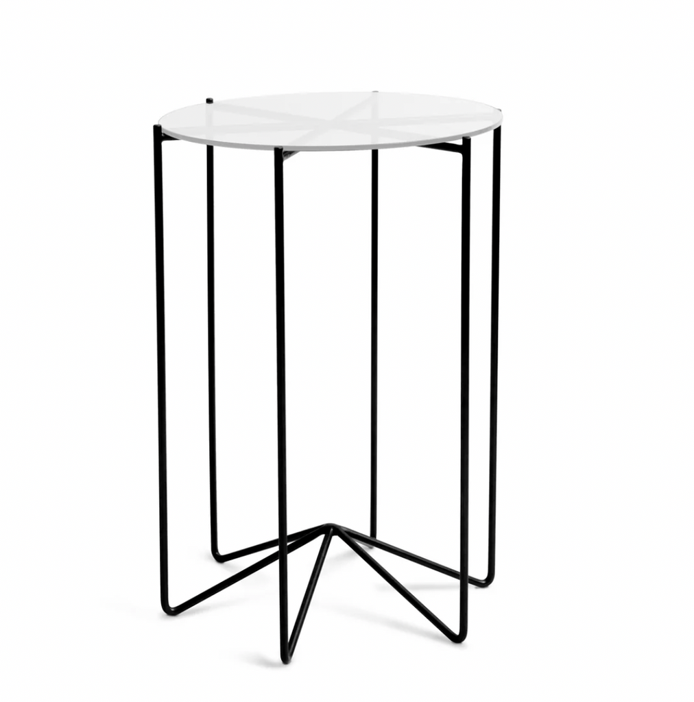 Studio CM | A modern metal side table with a tempered glass top