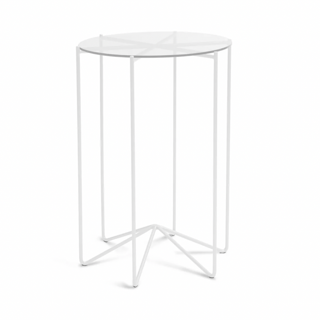 Studio CM | A modern metal side table with a tempered glass top