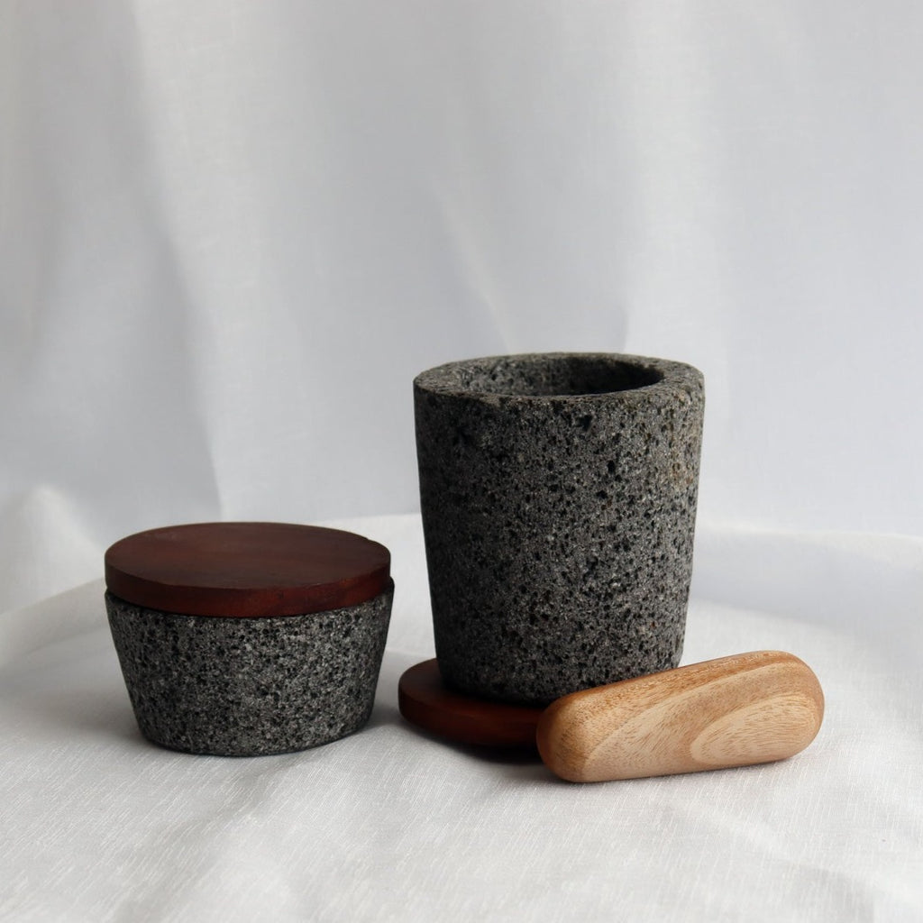 Studio CM | hand carved small and medium volcanic stone mortars with wooden tops and pestle