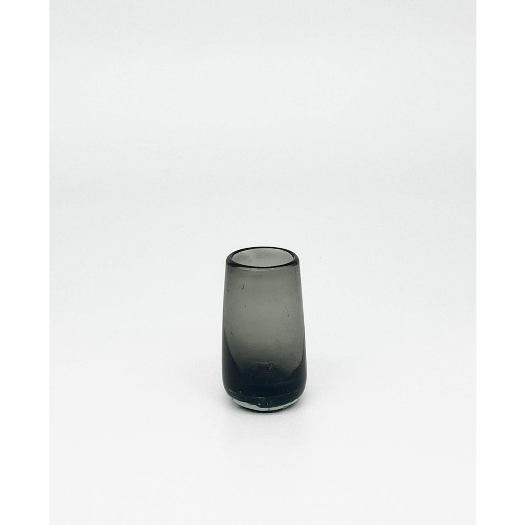 Studio CM | a single shot glass made of handblown black recycled glass